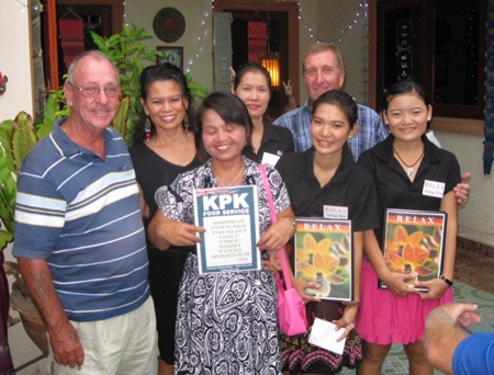 Tuesday winners with the staff at The Relax Bar.